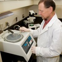 Craig preparing an otolith for radiocarbon analysis