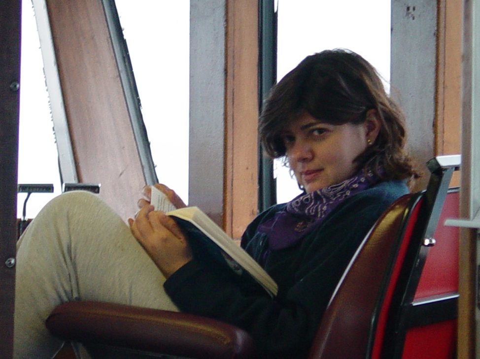 Ivonne reading while on a tagging research cruise to the Aluetians in 2003
