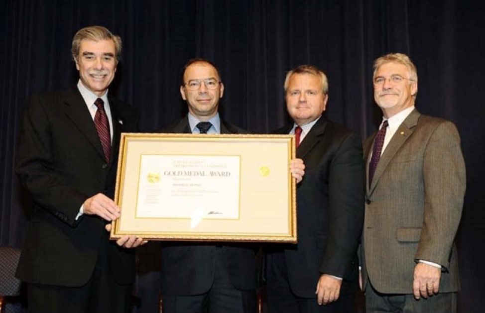 Rick receiving the Department of Commerce Gold Medal in 2008
