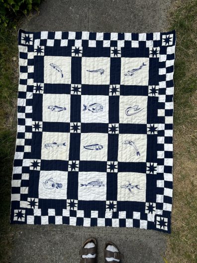 A black and white quilt.