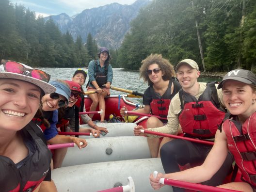 A group of people rafting on a river