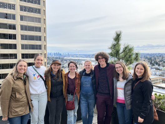 A group of students from the Olden Lab pose for a photo.